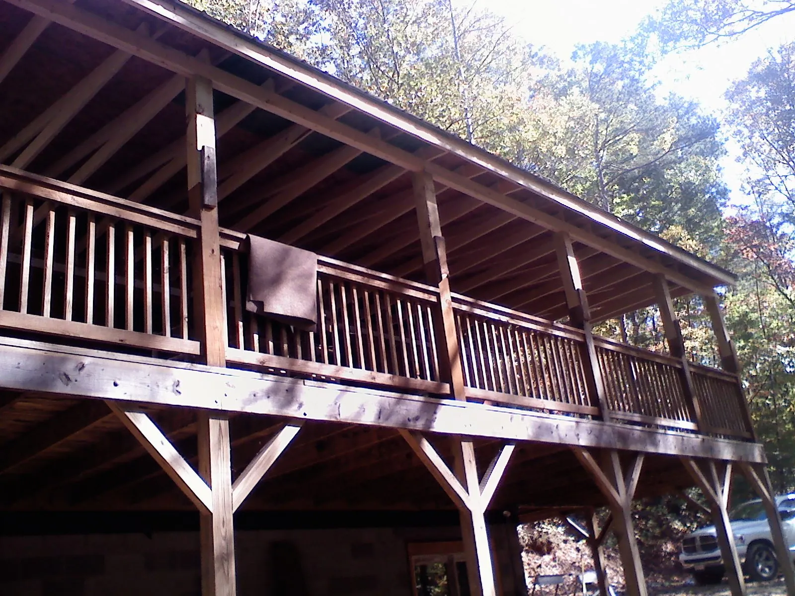 Timber framing under a new elevated porch and deck — Roof Leak Repair in Gansevoort by Roofing Brothers